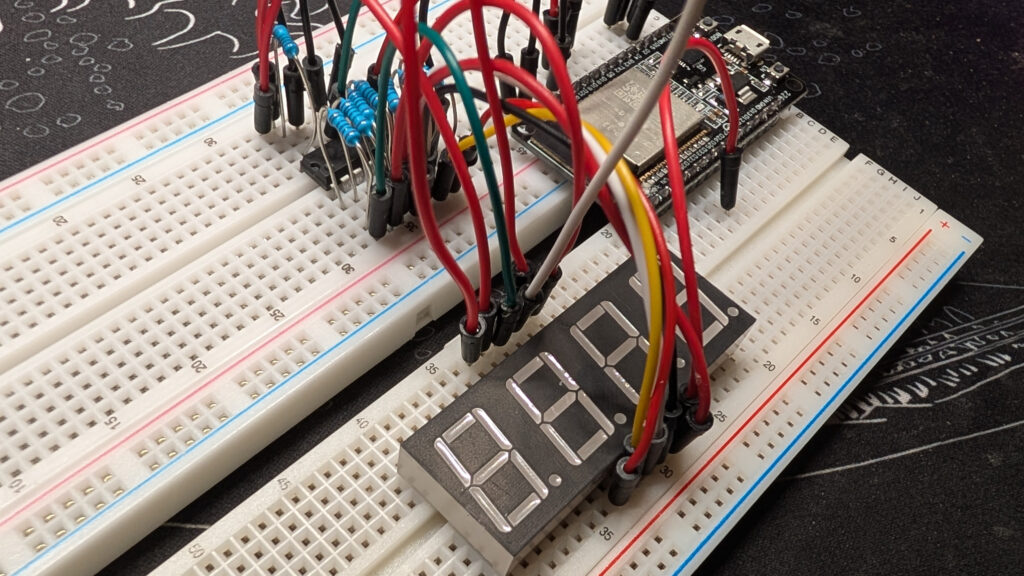 SN74HC595, 5461AS, and ESP32 crammmed on a breadboard